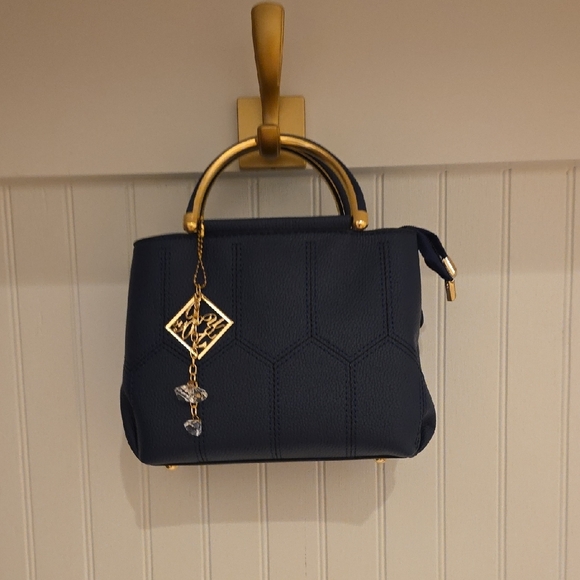 Elegant Navy Blue Handbag with Gold Accents - Picture 6 of 6